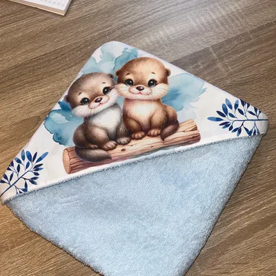 Cape de bain loutre bleu 